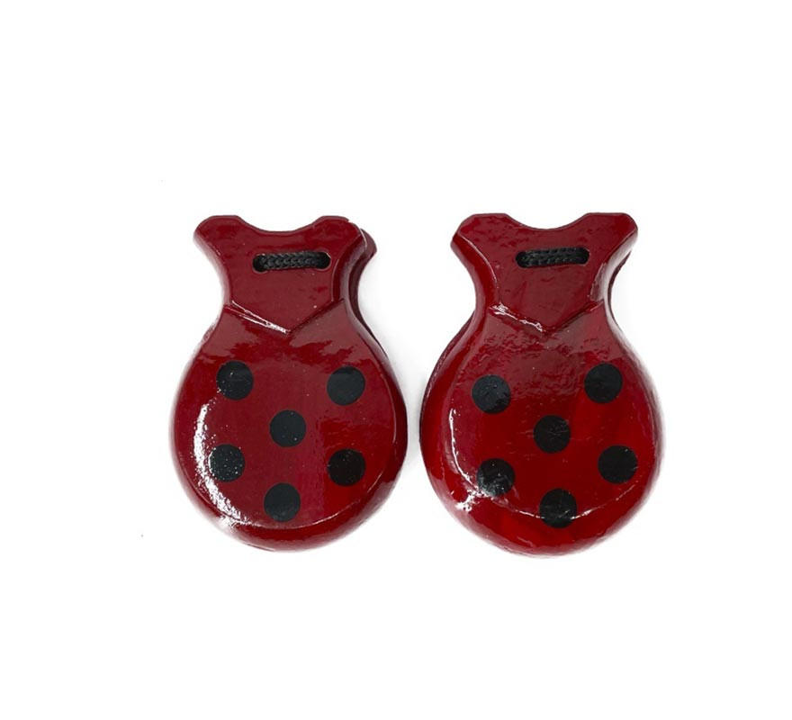 Red castanet with black polka dots measuring 6.5x9 cm