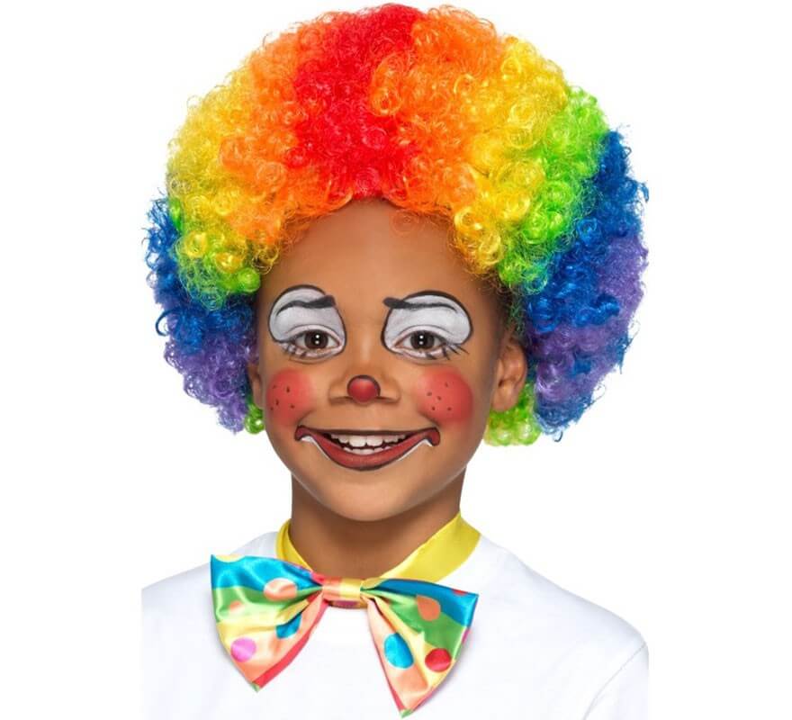 Immagini Stock - Un Simpatico, Sorridente Bambino Ragazzo È Vestito In Una Parrucca  Clown Con Pagliaccio Trucco Vernice Del Fronte. Image 20640848